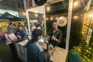 Artesanal beer festival, Taranaki Beer Festival, craft beer tasting, Deep Creek Brewery booth, local beer event, Taranaki craft brews.