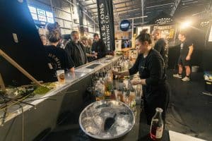 Vibrant scene at the Taranaki Beer Festival showcasing craft beer tasting and socialising.