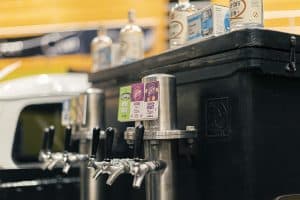 Cold beer taps at Taranaki Beer Festival, showcasing craft brews and local beverages in New Zealand.