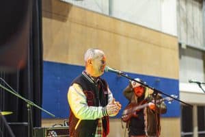 Vibrant live music performance at Taranaki Beer Festival featuring local bands and craft beer enthusiasts.