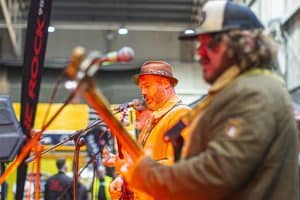 Live band performing at the Taranaki Beer Festival showcasing local craft beers and vibrant entertainment.