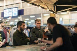 Crowd enjoying craft beers at Taranaki Beer Festival in New Zealand.