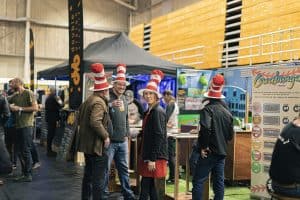 Colourful Drunk Hatted Festival Attendees at Taranaki Beer Festival.