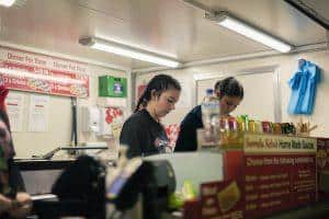 Freshly prepared food at Taranaki Beer Festival food stall, showcasing local NZ cuisine.