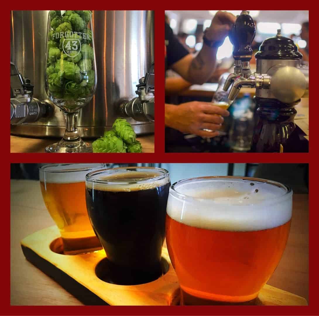 Bottle of craft beer with hops, beer tap at Taranaki Beer Festival, New Zealand.