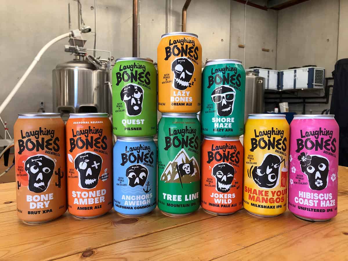 Bright colourful cans of Laughing Bones brewing beers at Taranaki Beer Festival, showcasing popular New Zealand craft beers.