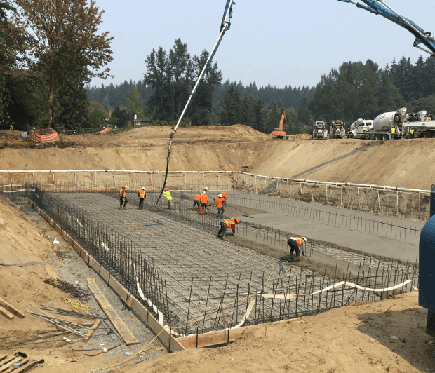 Team Nelson concrete pour with pump truck and rebar - stormwater vault installation