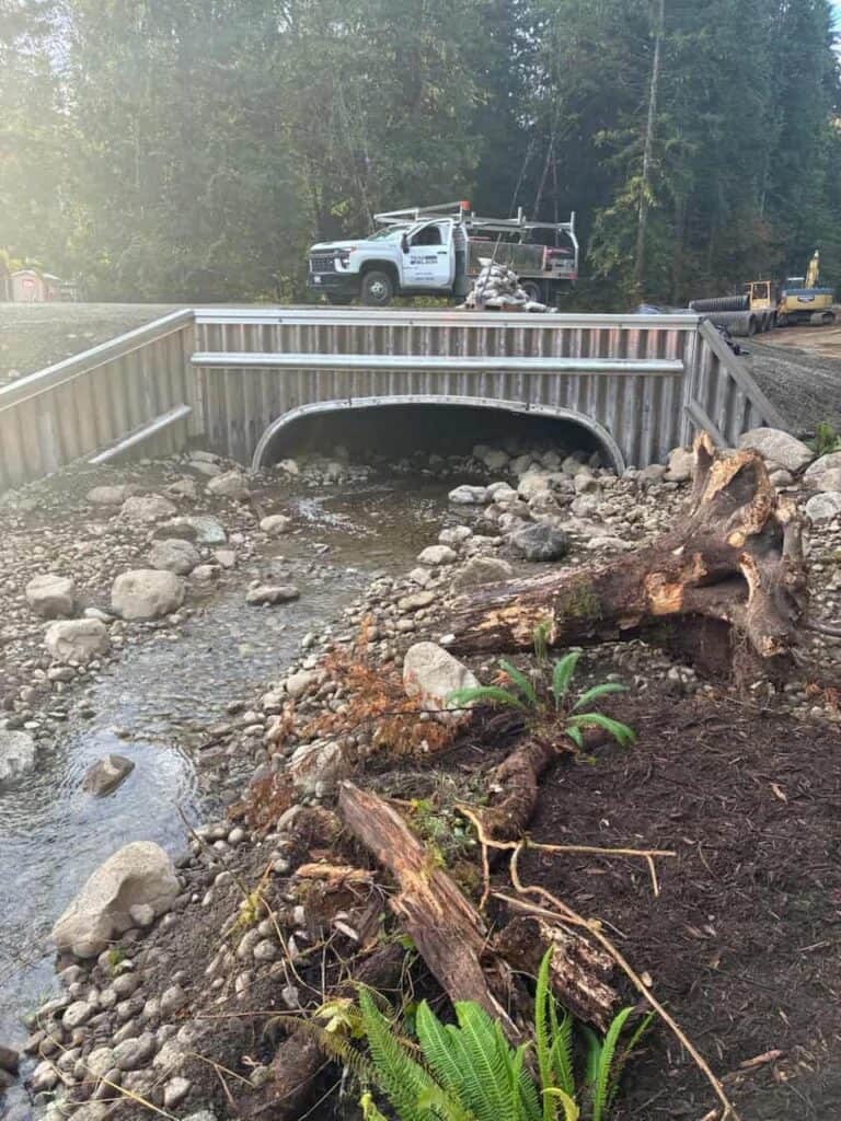 Water flowing through completed Caledon culvert drainage infrastructure