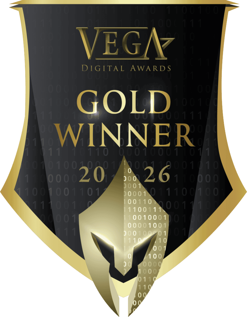 Vega Gold Winner 2026 badge with digital binary code background, celebrating excellence in digital a.