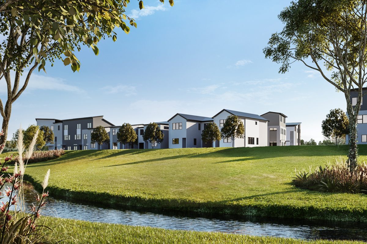 Modern Te Tumu Kāinga housing development with lush green landscape in New Zealand.