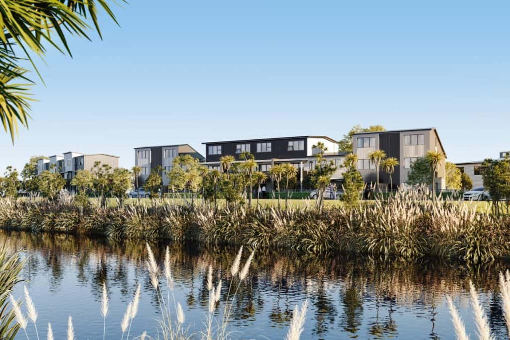 Contemporary Te Tumu Kāinga homes near water with lush landscaping and tropical trees, ideal for modern urban living in NZ.