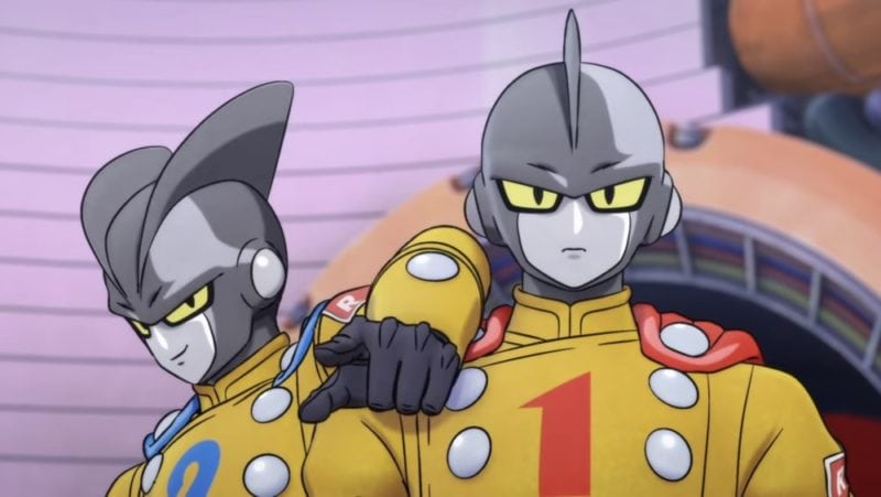 Two android characters from Dragon Ball Super in yellow suits with serious expressions.