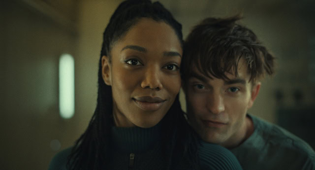 Naomi Ackie and Robert Pattinson as Nasha and Mickey in Mickey 17