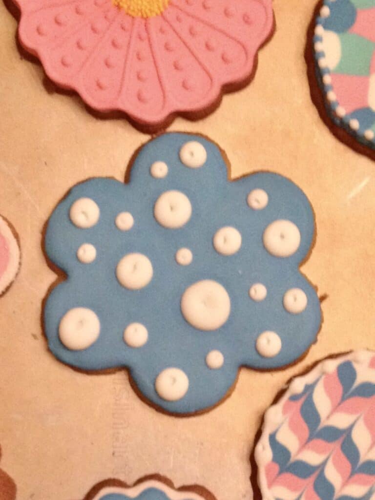 royal icing cookie with a crater 