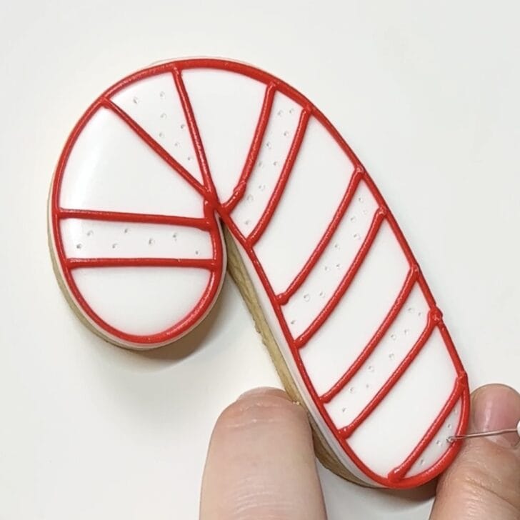 how to prevent craters when writing with royal icing: holes