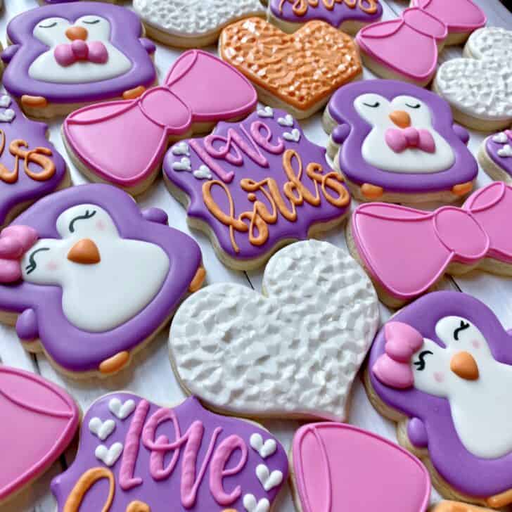 photo of set of love bird sugar cookies decorated with royal icing