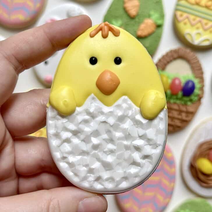 chick easter egg sugar cookie decorated with royal icing