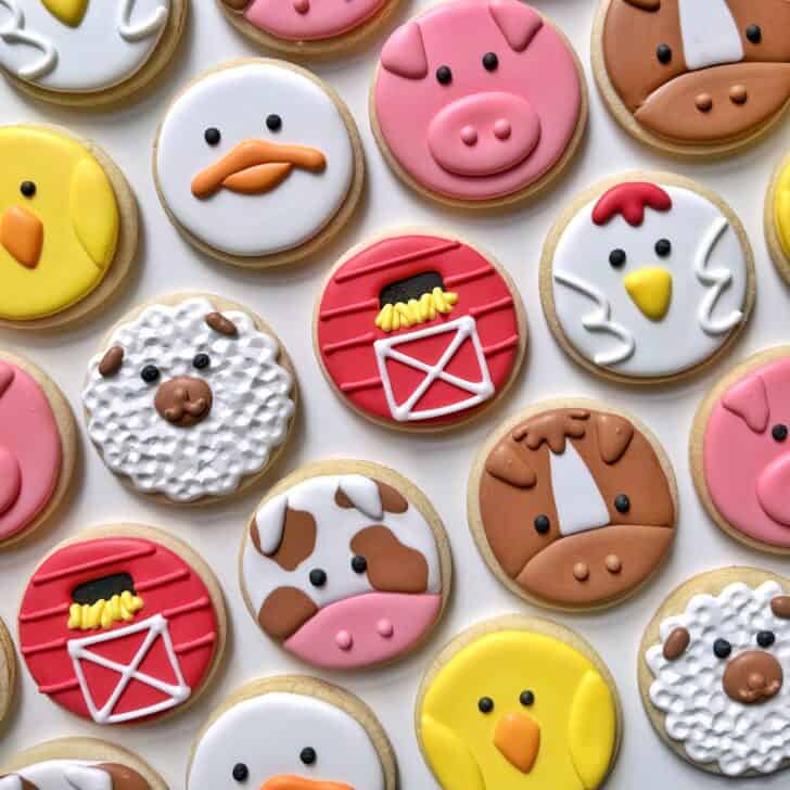 photo of barnyard animal circle sugar cookies decorated with royal icing