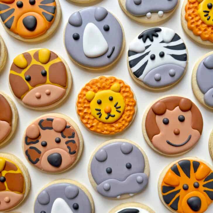 photo of safari animal circle sugar cookies decorated with royal icing