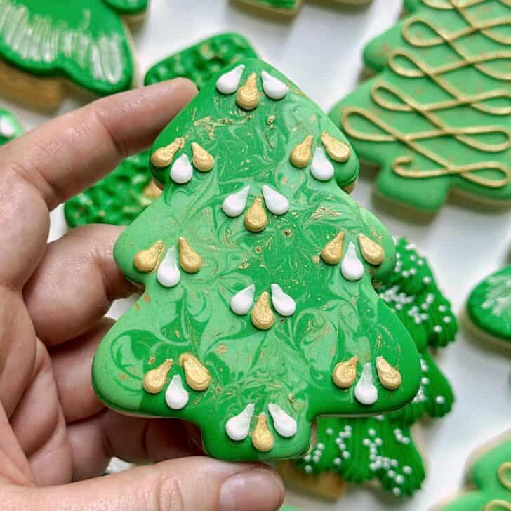 marble christmas tree cookie with royal icing