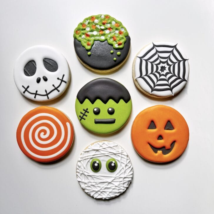 photo of easy circle halloween sugar cookies decorated with royal icing