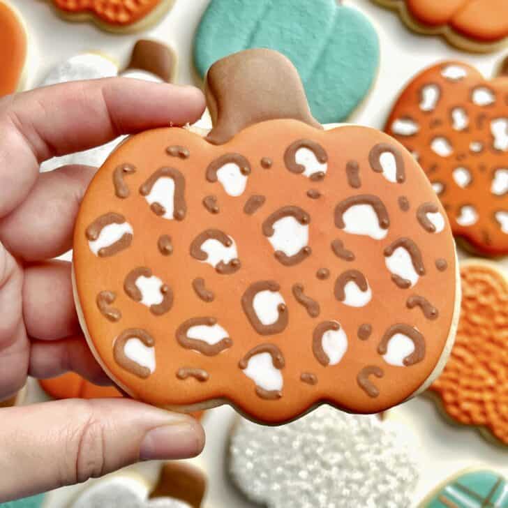 leopard Pumpkin Cookies with royal icing