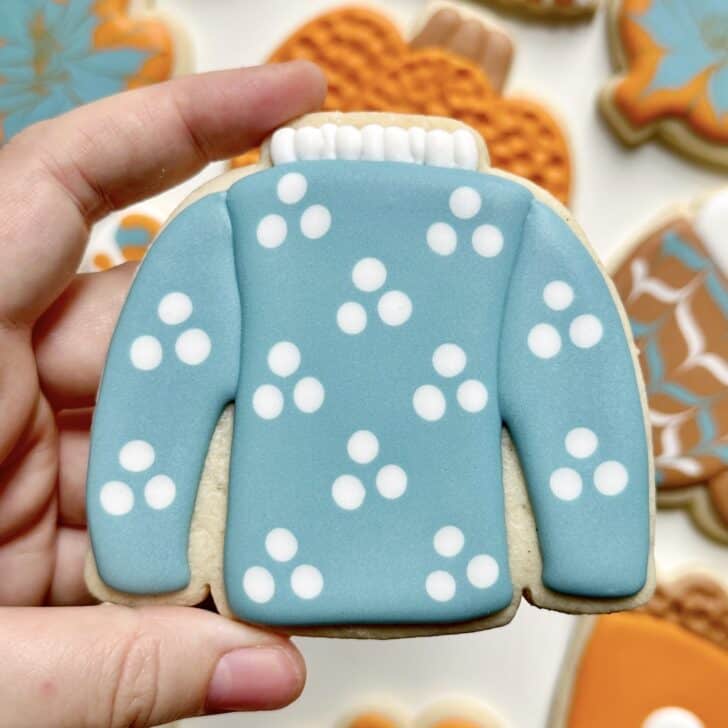 sweater cookies decorated with royal icing