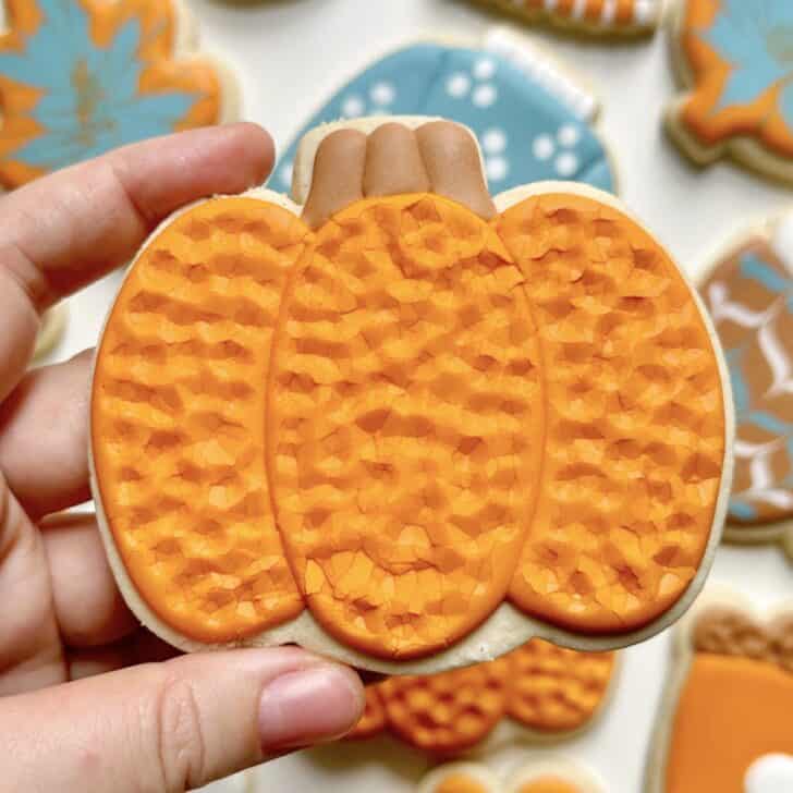 pumpkin cookies decorated with royal icing