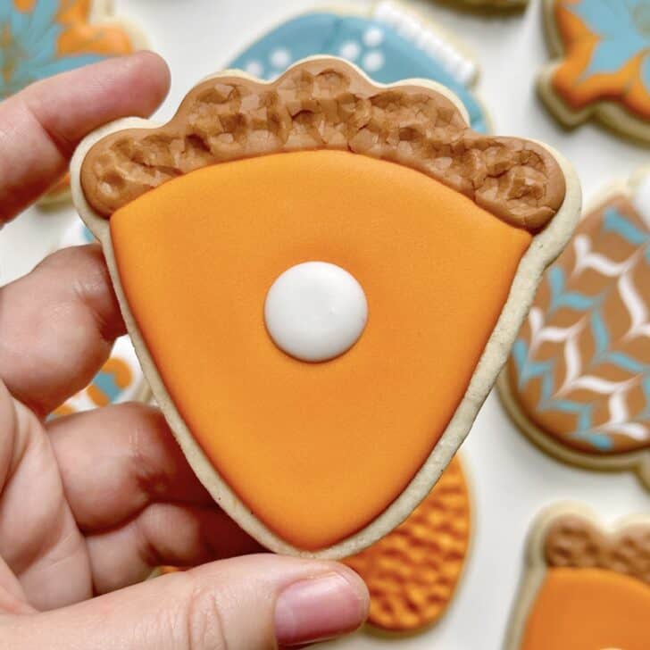 pumpkin pie cookies decorated with royal icing