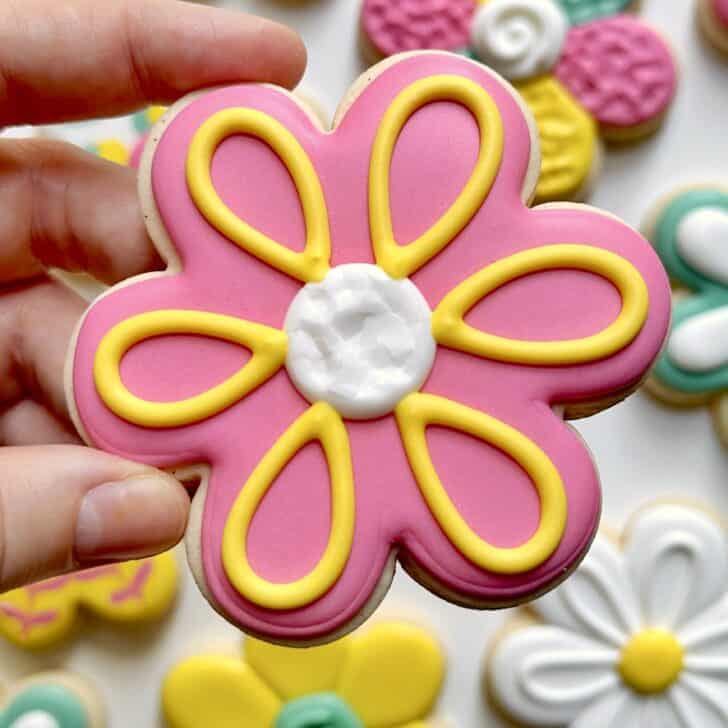 pink flower cookies decorated with royal icing
