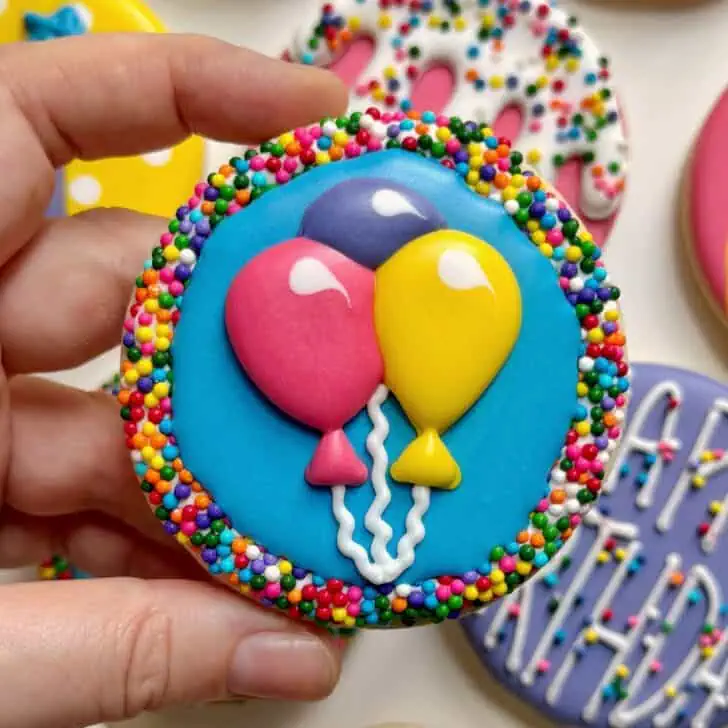 balloon cookies decorated with royal icing