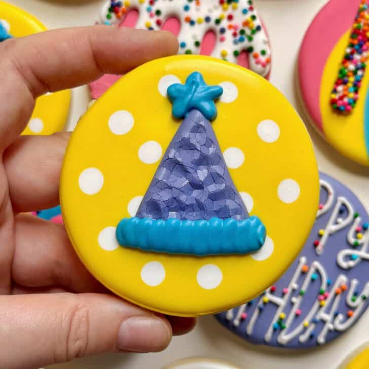 birthday hat cookies decorated with royal icing