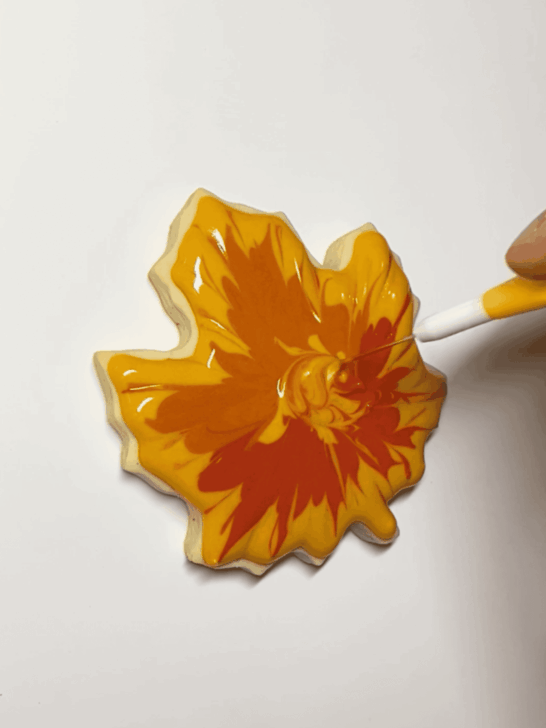 how to decorate a maple leaf cookie with royal icing