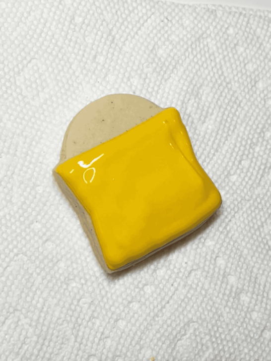 how to decorate candy bucket cookies with royal icing 