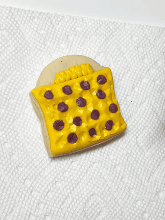 how to decorate candy bucket cookies with royal icing 