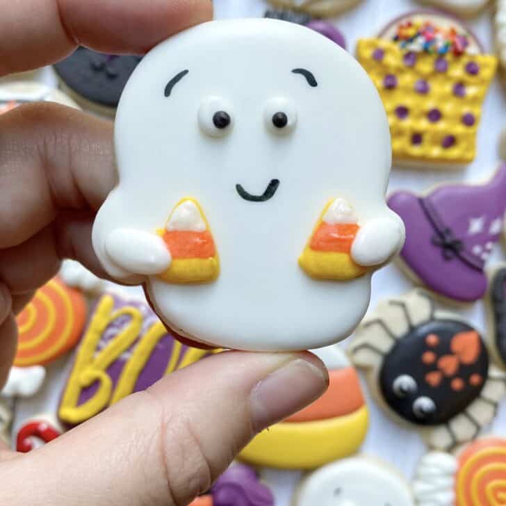 ghost cookie decorated with royal icing