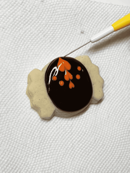 how to decorate spider sugar cookies with royal icing 
