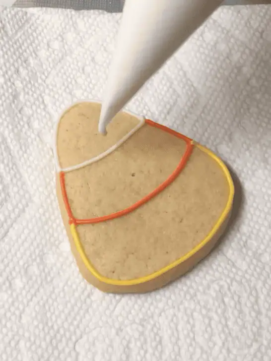 how to decorate candy corn sugar cookies with royal icing