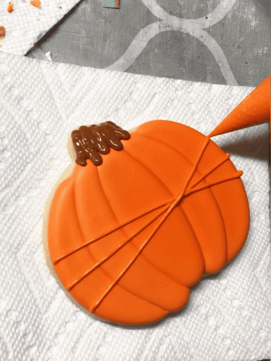 how to decorate Decorated Pumpkin Cookies with royal icing

