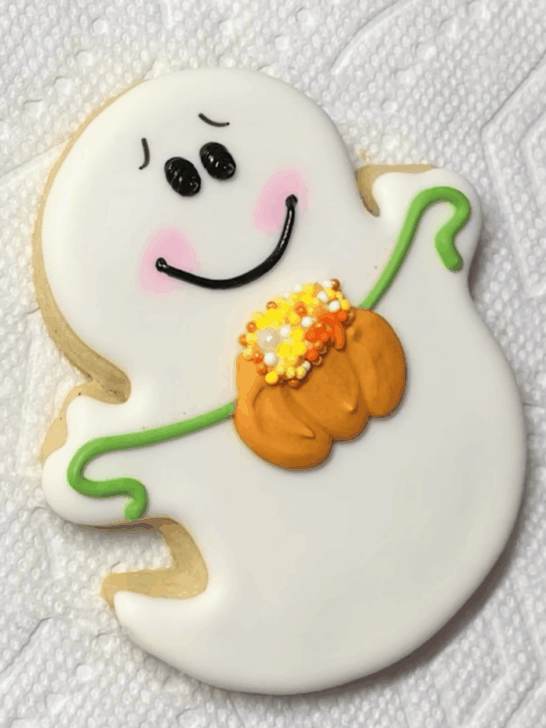 how to decorate ghost Halloween cookies with royal icing