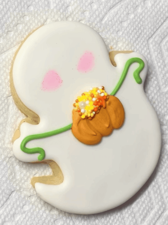 how to decorate ghost Halloween cookies with royal icing