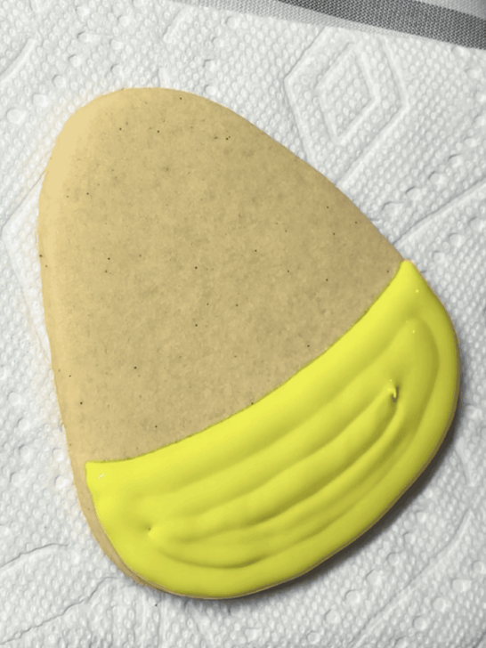 how to decorate decorated candy corn cookies with royal icing