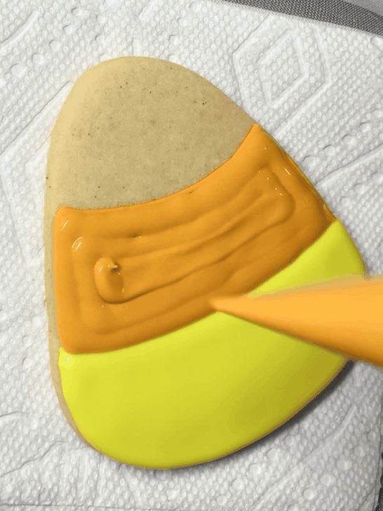 how to decorate decorated candy corn cookies with royal icing