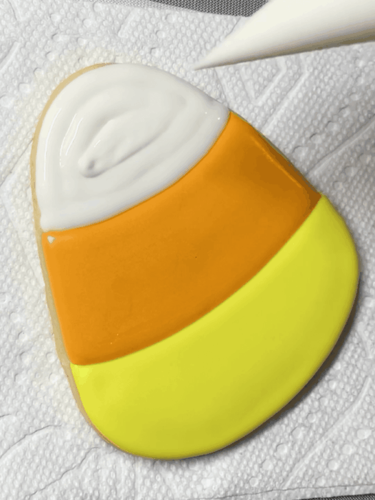 how to decorate decorated candy corn cookies with royal icing
