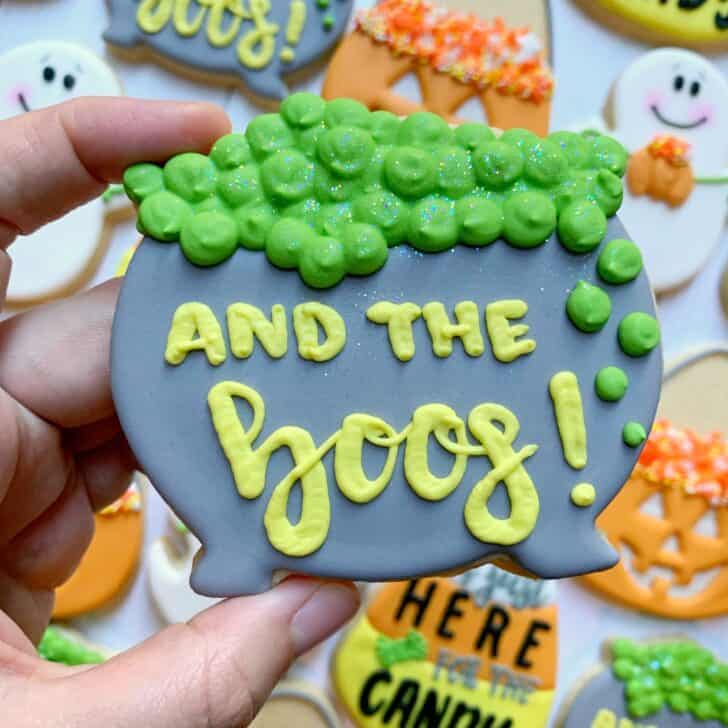 cauldron cookie decorated with royal icing
