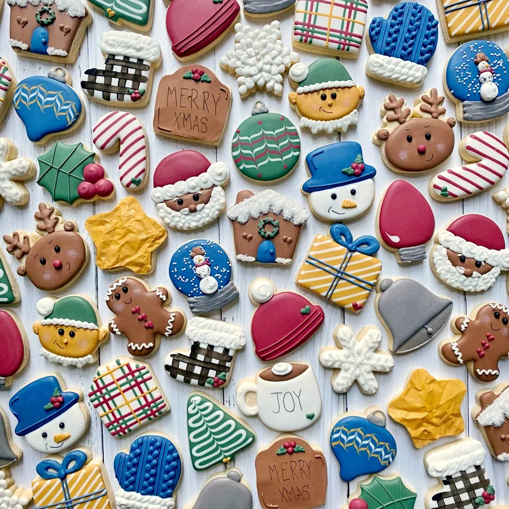 mini christmas cookies decorated with royal icing