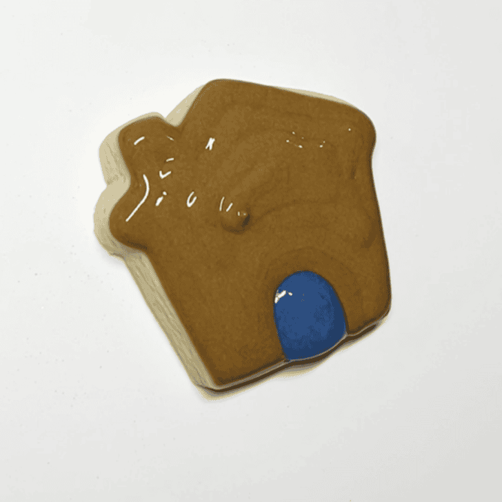 step by step decorating instructions for Mini Gingerbread House Cookies