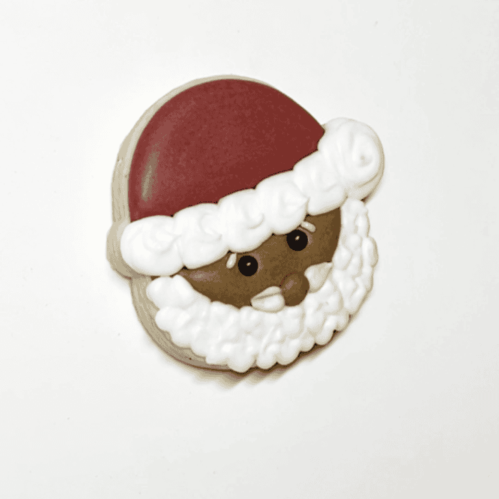 step 6 for decorating a santa cookie with royal icing