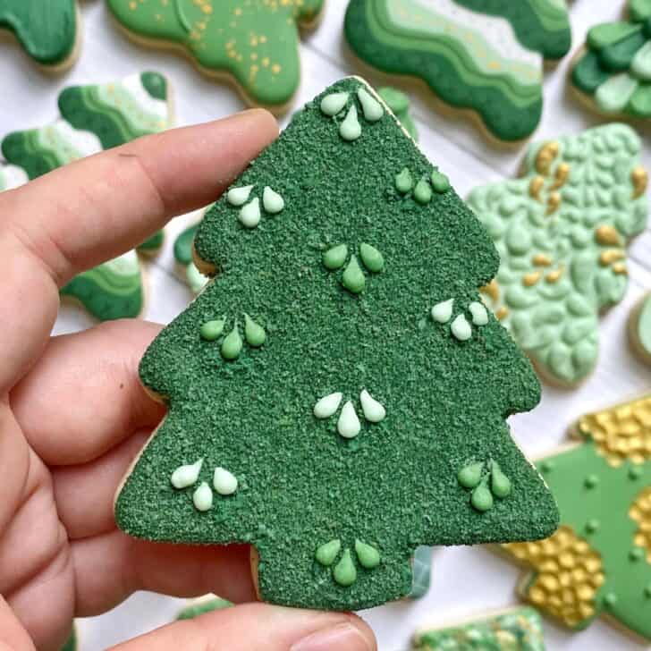 edible moss on a sugar cookie decorated as a christmas tree
