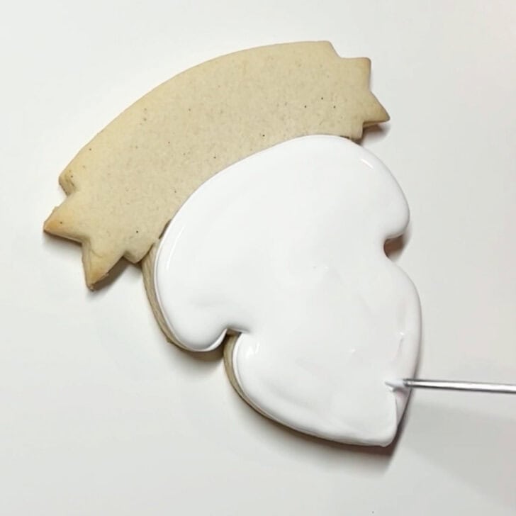 how to decorate teaching is a work of heart cookies with royal icing